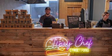 Tipsy Chef Street Food trader behind stall