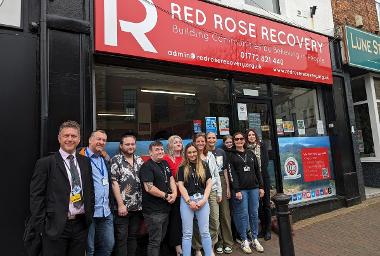 People outside Red Rose Recovery