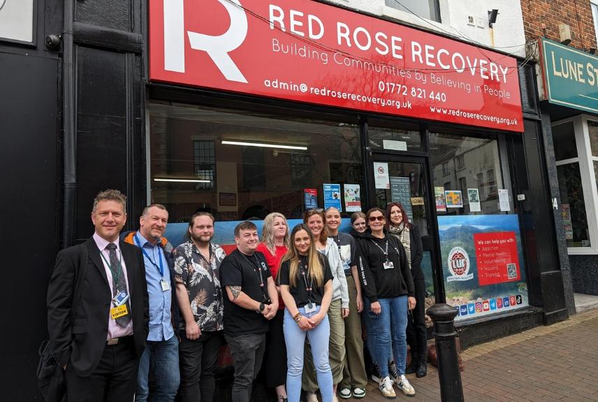 People outside Red Rose Recovery