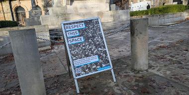 A sign saying Respect this Space for the New Campaign Launched to Protect Preston’s Cenotaph