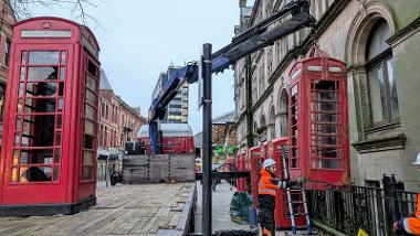 Telephone box being lifted 