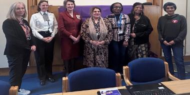 A group of women posing for an event