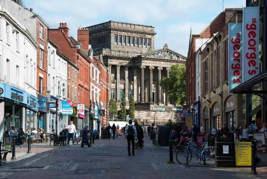 Shoppers in Preston City Centre looking towards the Harris